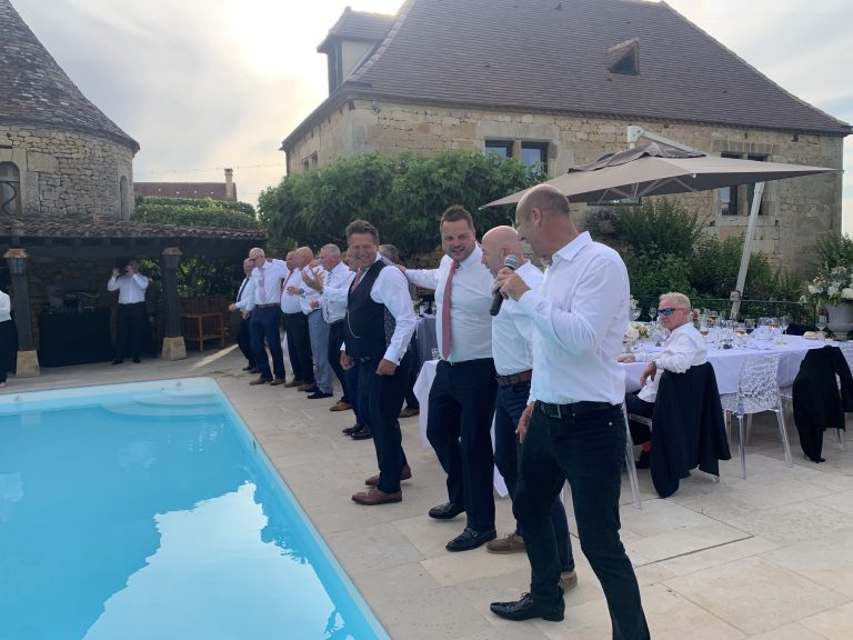 everyone singing around the pool